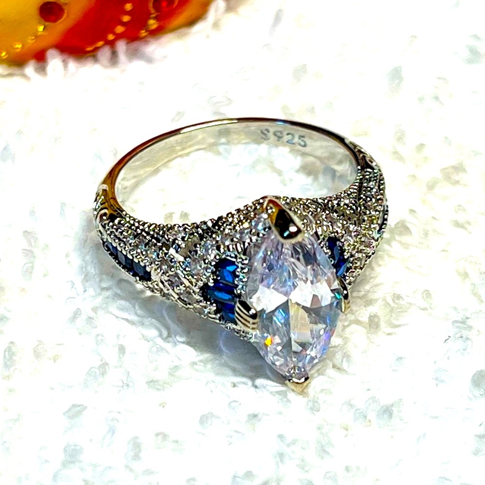 Romantic art deco style silver ring, sterling blue and white stones